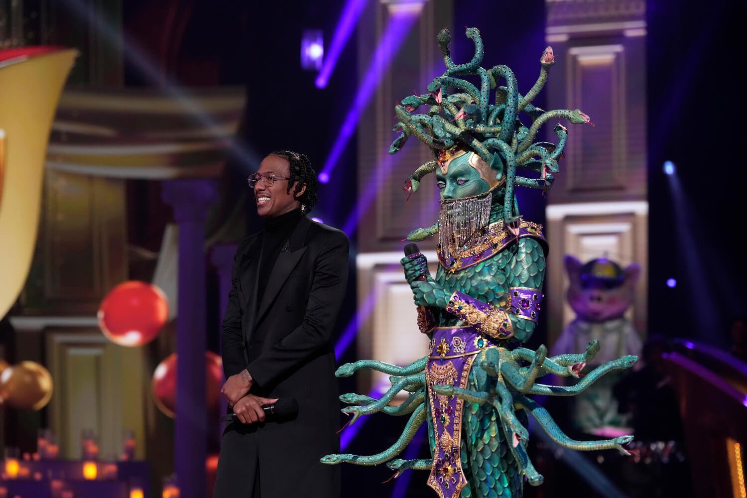 Medusa and Nick Cannon stage in 'The Masked Singer' Season 9 