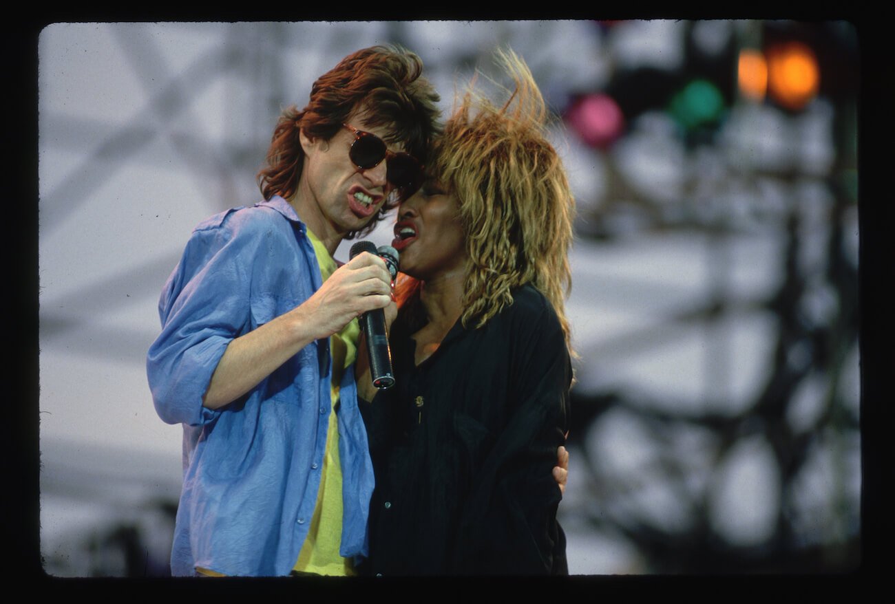 Tina Turner and Mick Jagger performing at Live Aid in 1985.