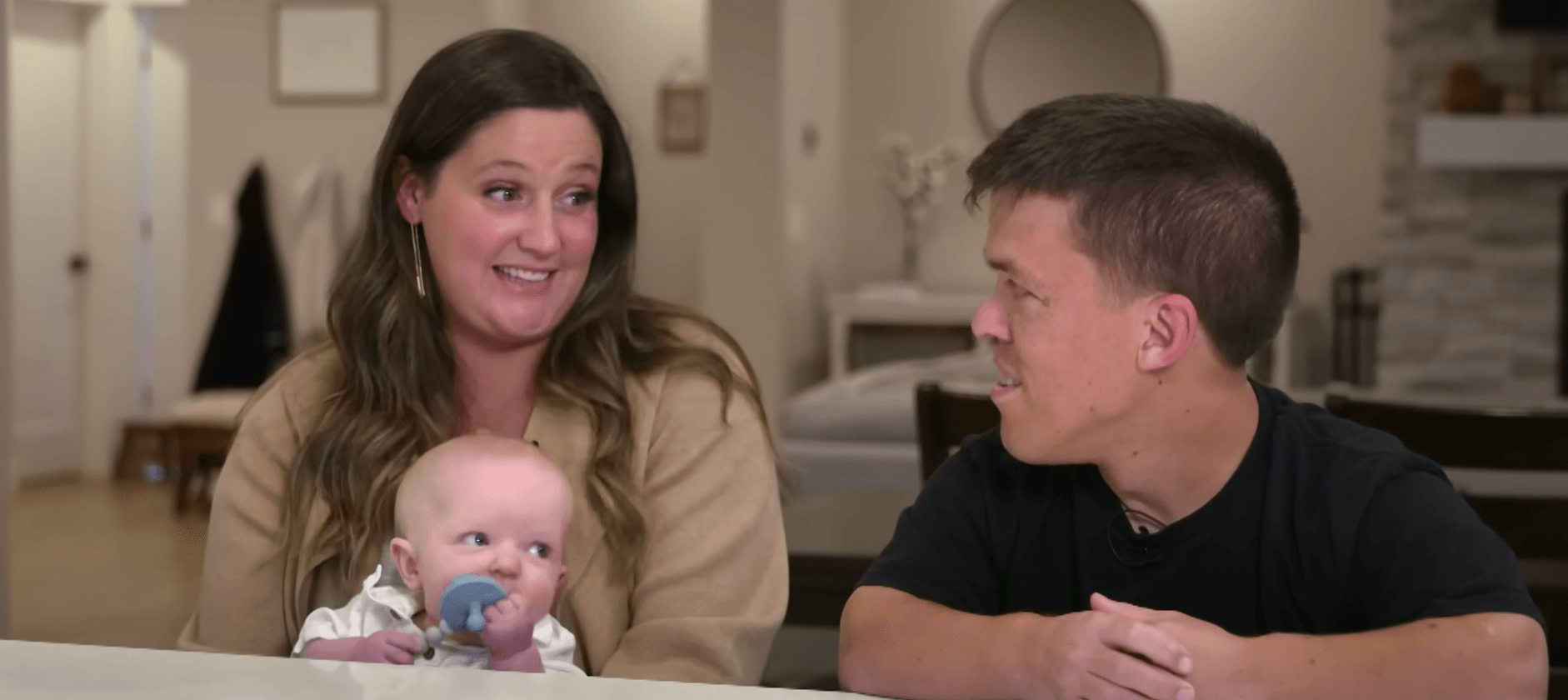 Tori Roloff and Zach Roloff from 'Little People, Big World' sitting with Josiah Roloff for an interview
