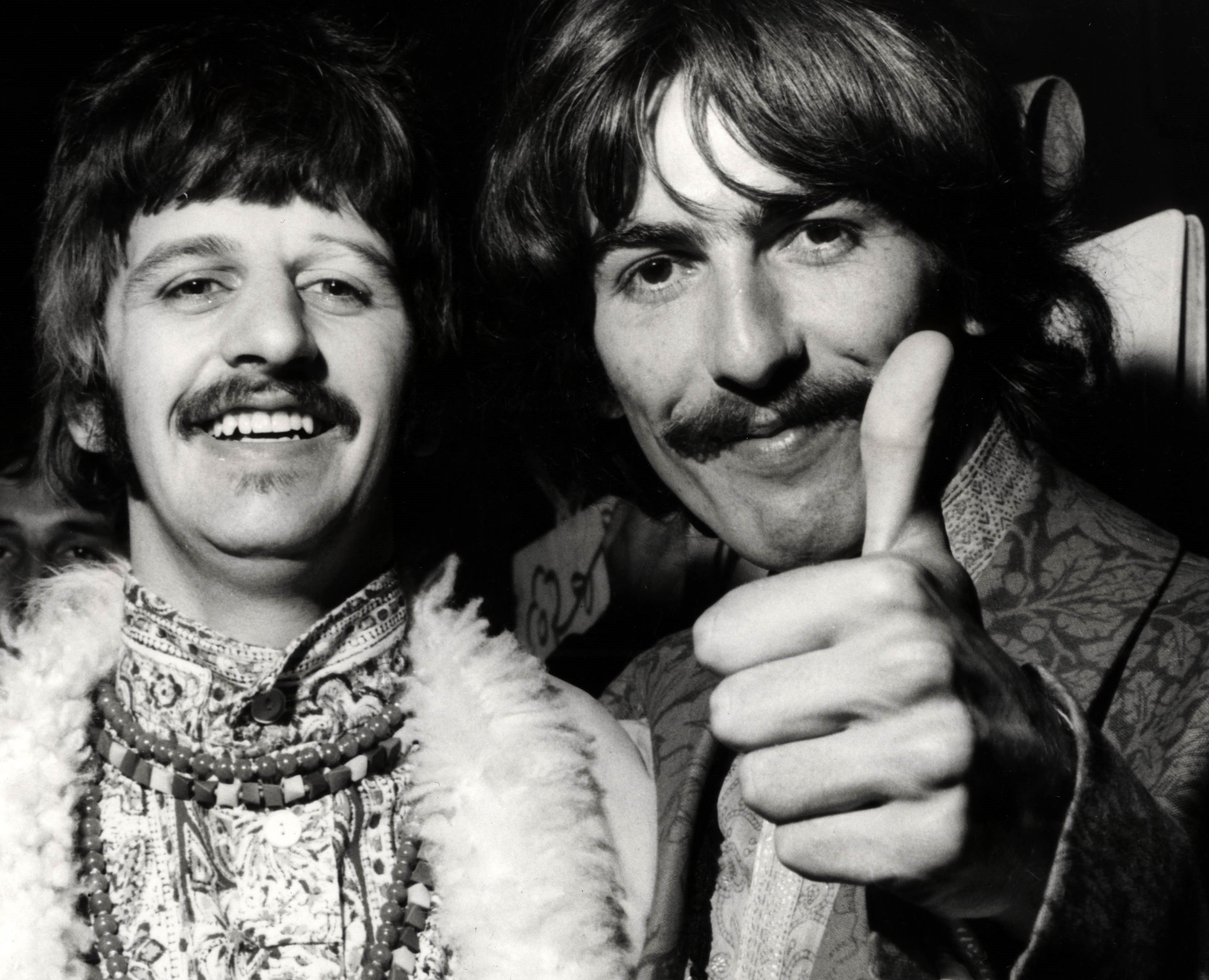 Ringo Starr with George Harrison in black-and-white