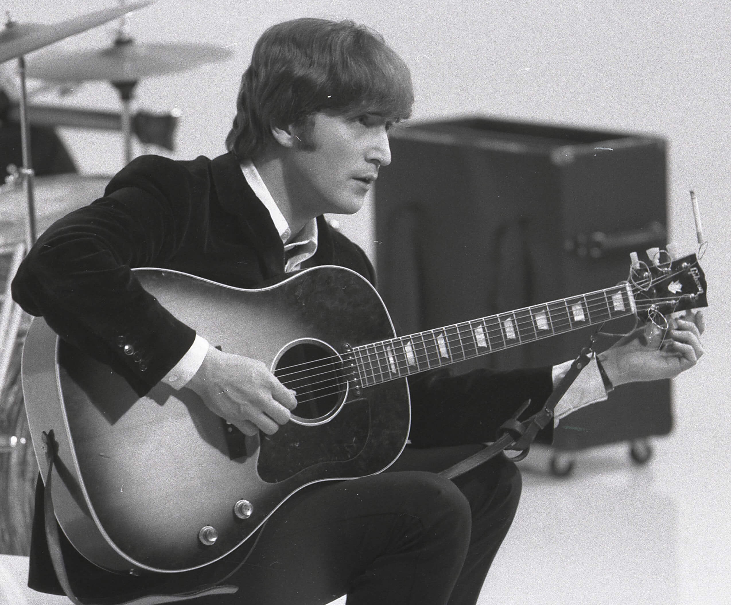 The Beatles' John Lennon with a guitar