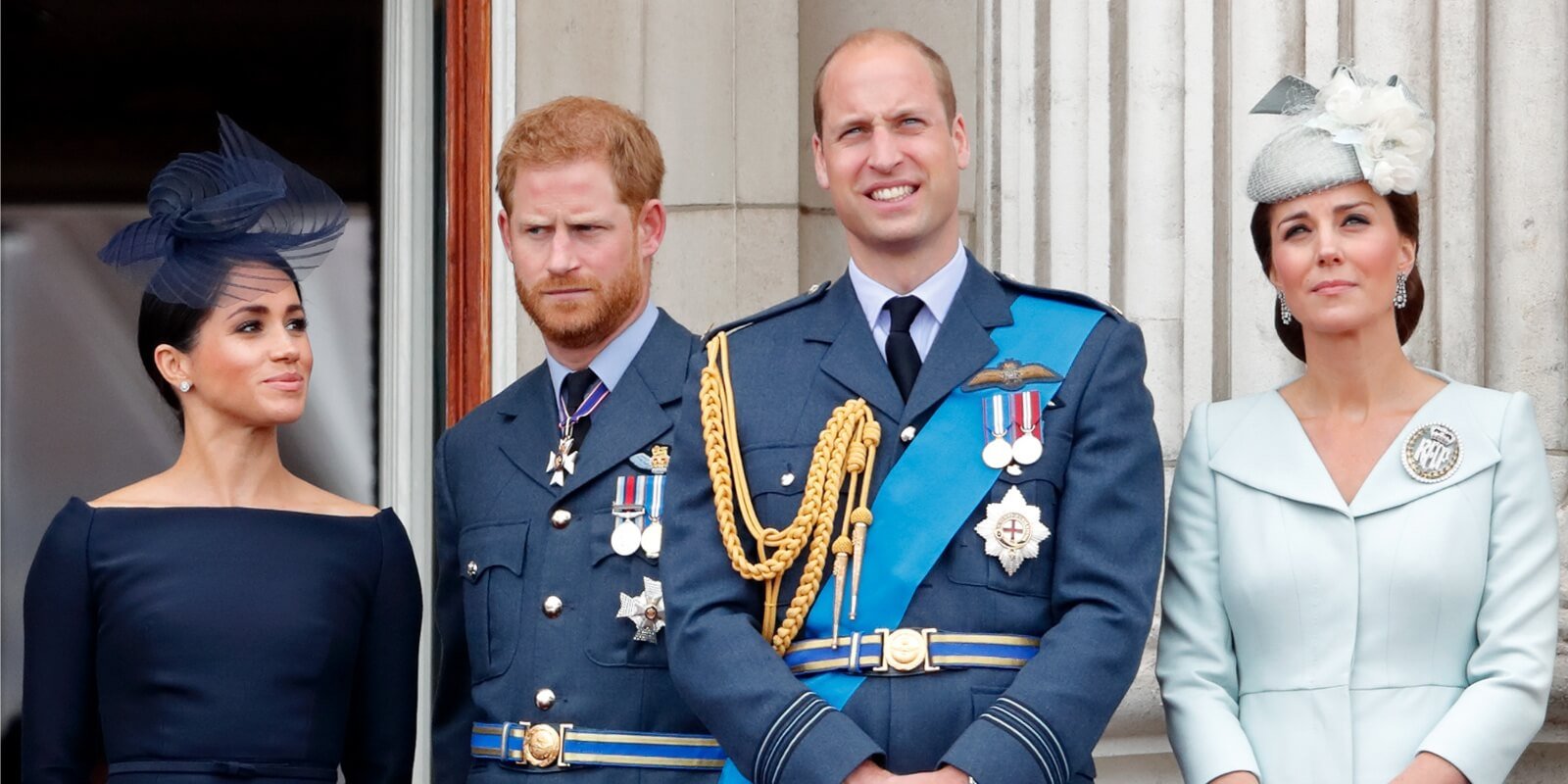 Meghan Markle, Prince Harry, Prince William and Kate Middleton watch a flypast to mark the centenary of the Royal Air Force from the balcony of Buckingham Palace on July 10, 2018.