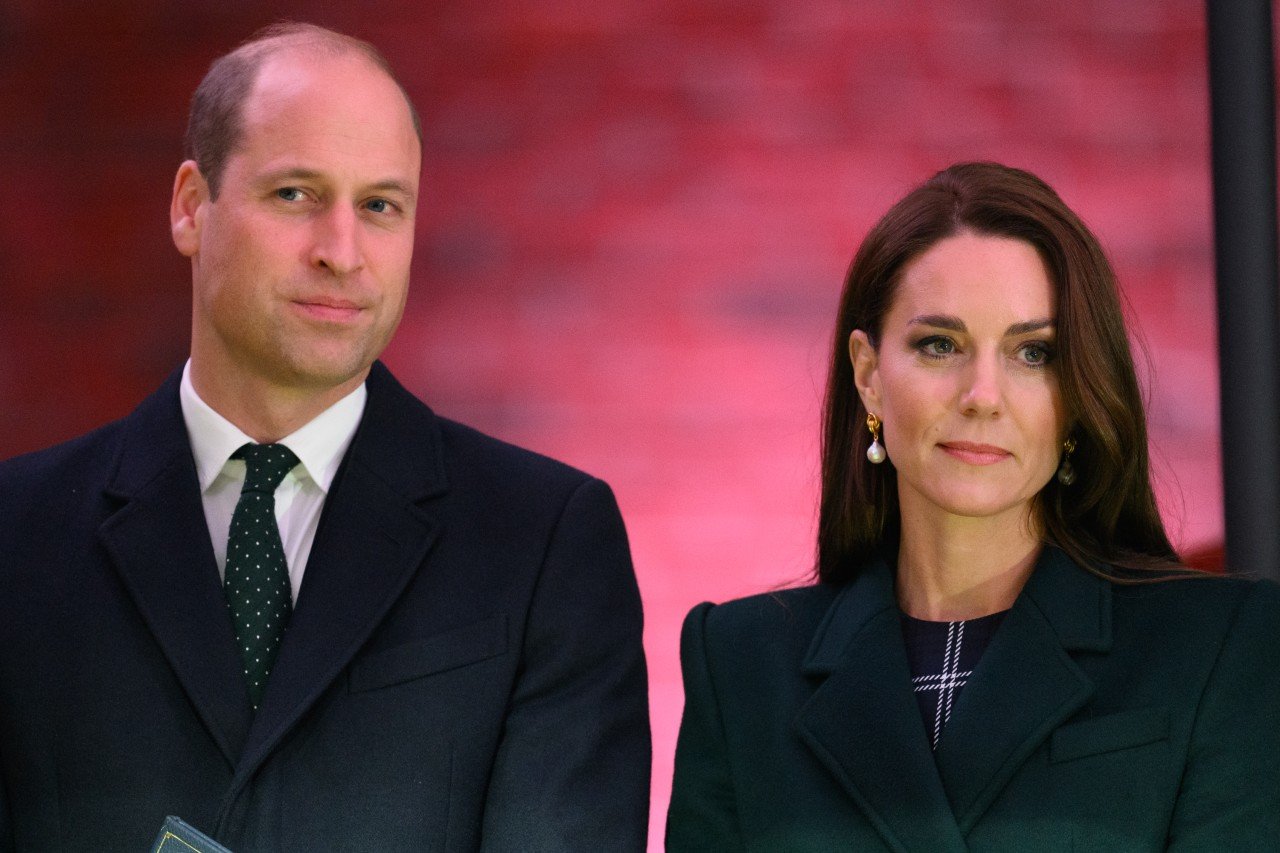 Prince William and Kate Middleton stand next to each other during an event.