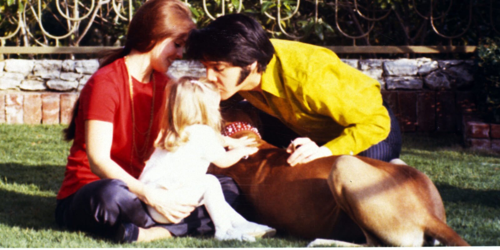 Lisa Marie Presley pictured with Priscilla and Elvis Presley at Graceland in Memphis, TN.