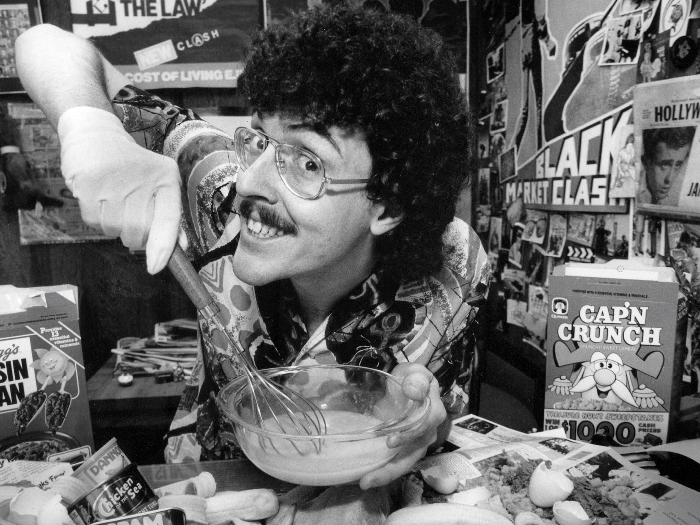 "Weird Al" Yankovic holding a whisk