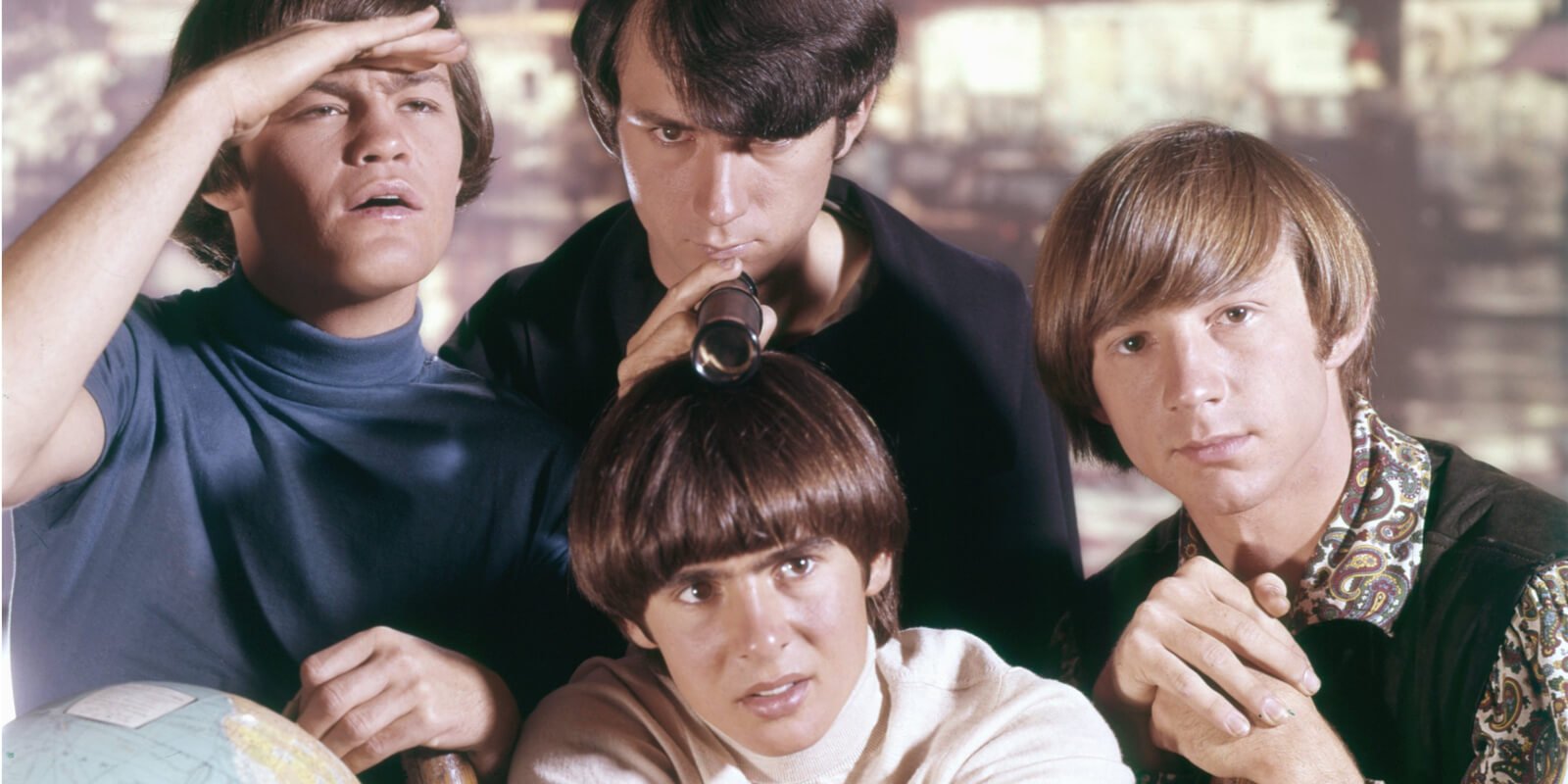 The Monkees members included Micky Dolenz, Davy Jones, Mike Nesmith, and Peter Tork.