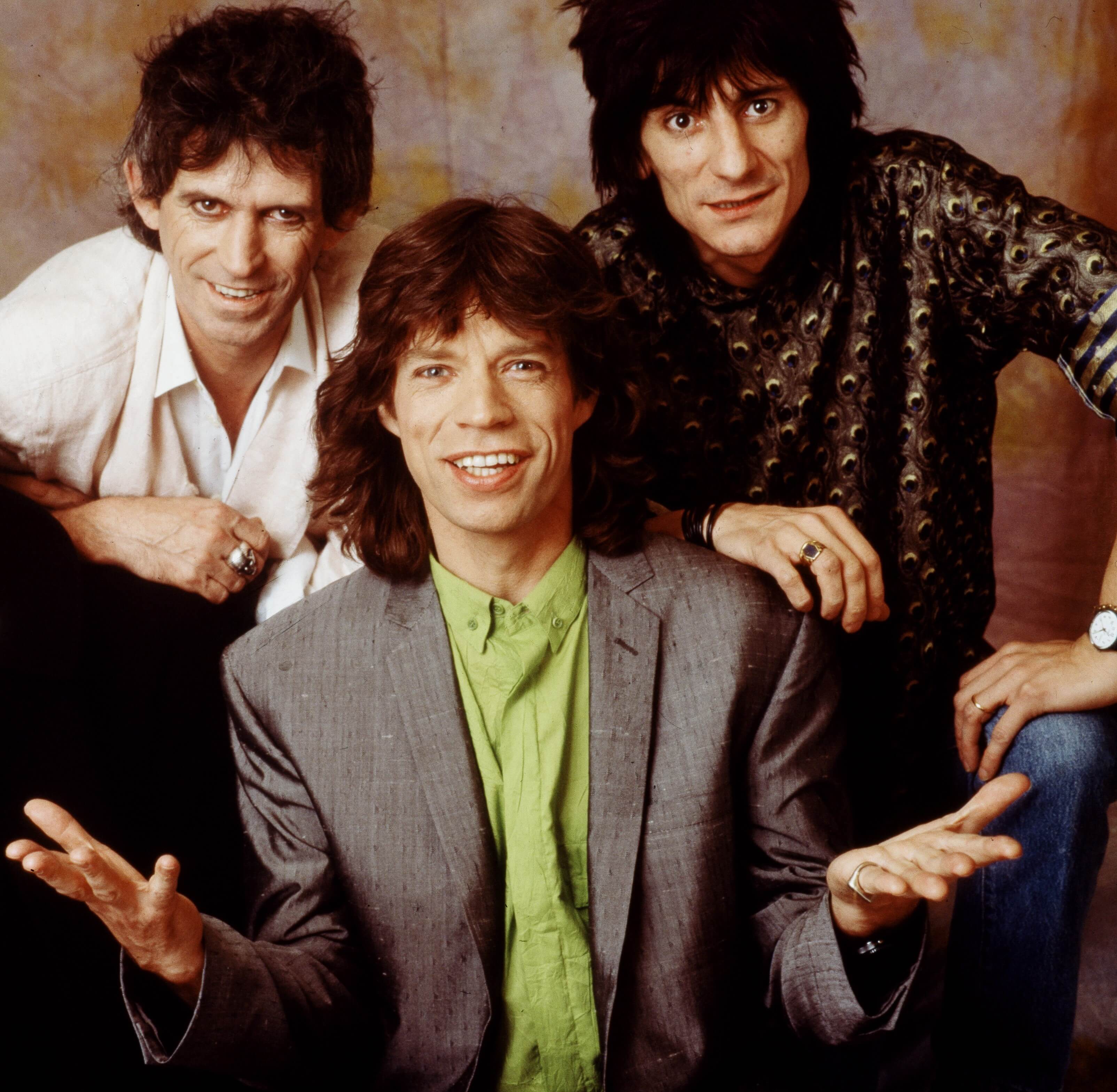 The Rolling Stones smiling during the "Start Me Up" era