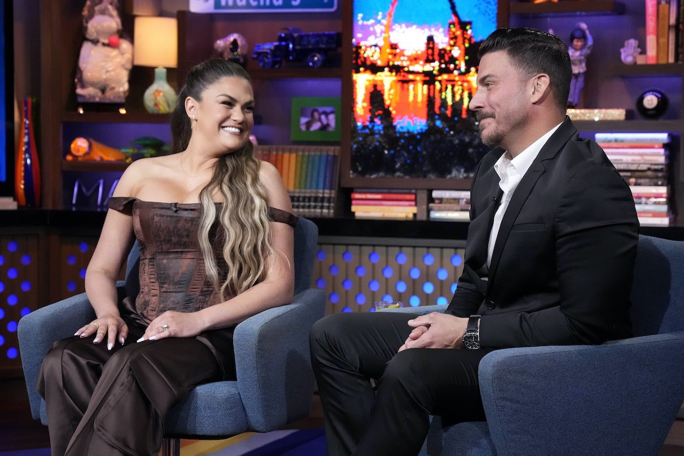 Brittany Cartwright and Jax Taylor from 'Vanderpump Rules' sit in chairs on 'WWHL'