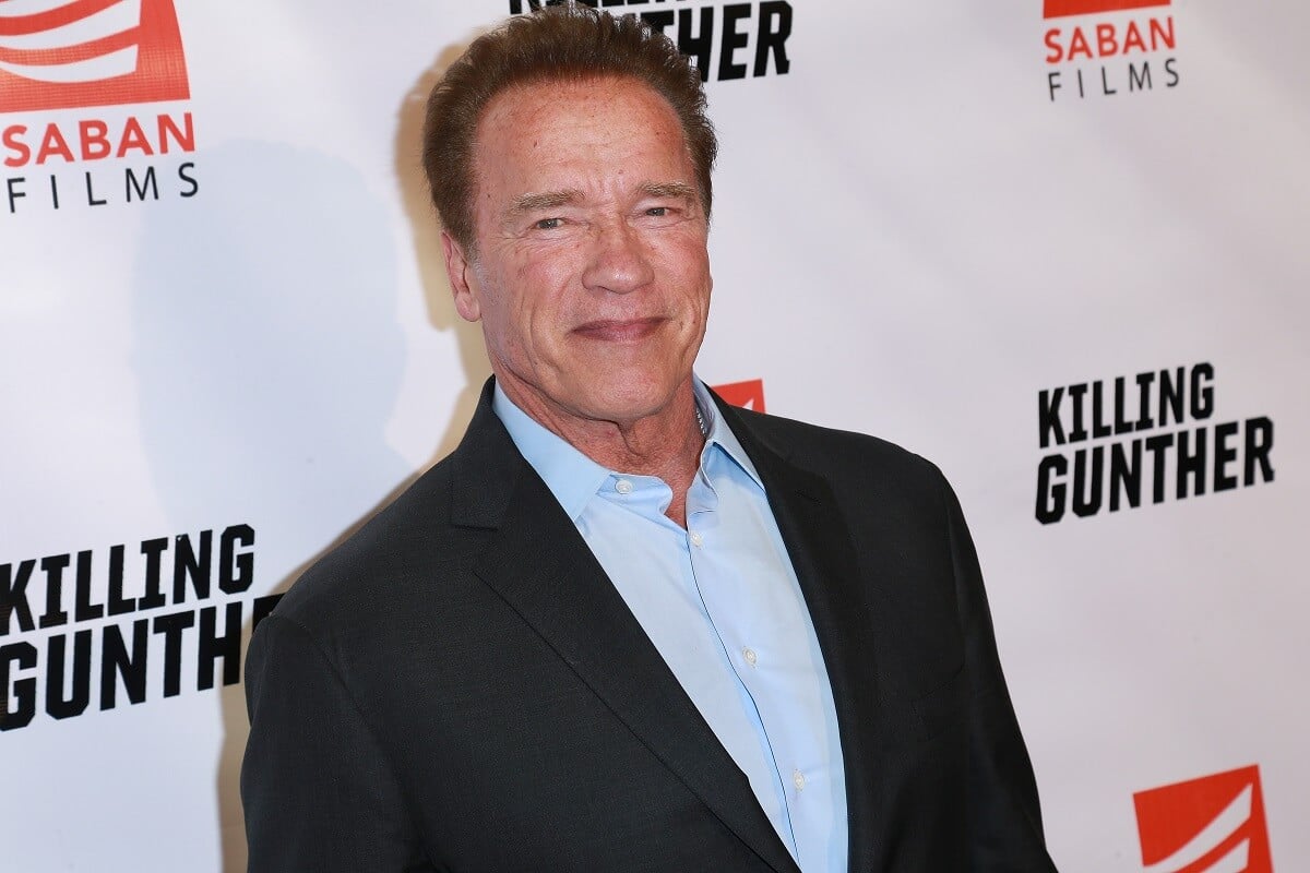 Arnold Schwarzenegger posing in a picture for the 'Killing Gunther' premiere.