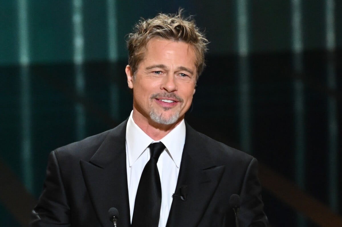 Brad Pitt posing on stage at the 48th Cesar Film Awards.