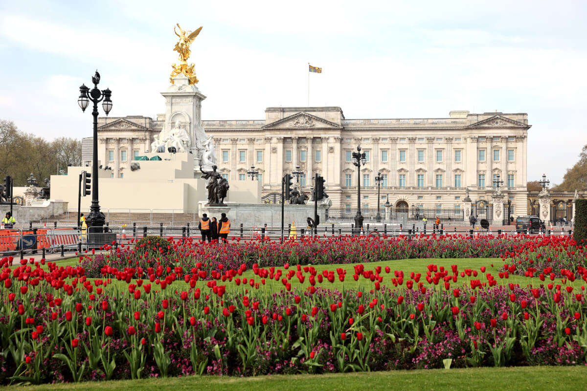 Flowers bloom in front of Buckingham Palace ahead of the coronation of King Charles III, which takes place on May 6th