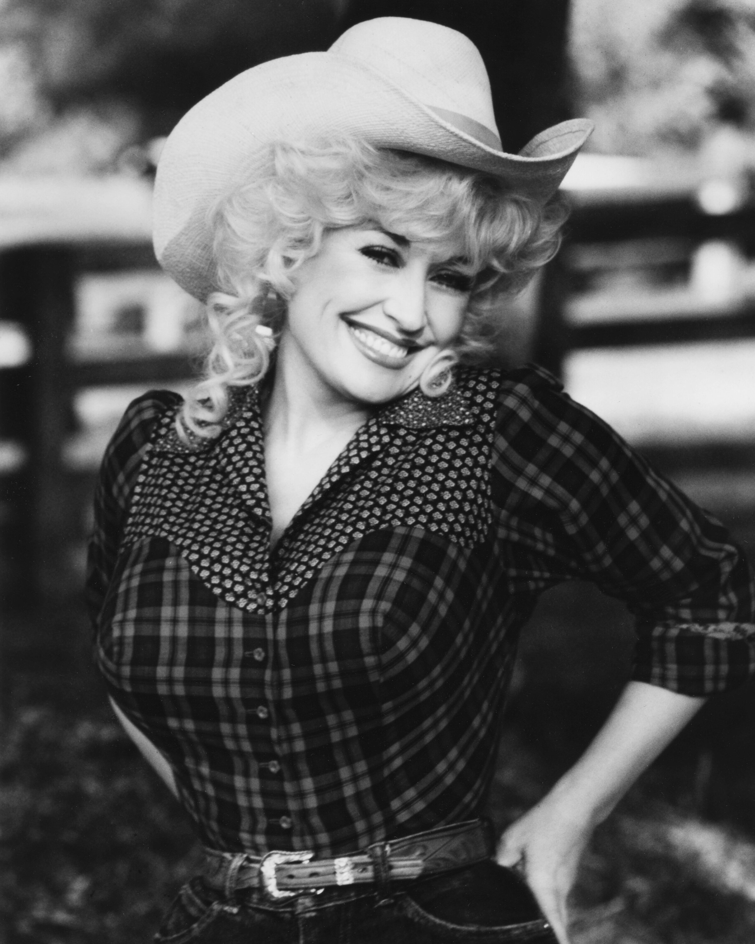 Dolly Parton in a cowgirl hat.