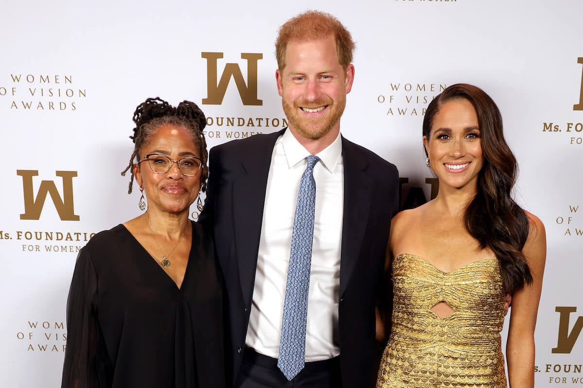 Doria Ragland, Prince Harry, and Meghan Markle, who displayed 'family unity' at the 2023 Women of Vision Awards, pose together at the ceremony