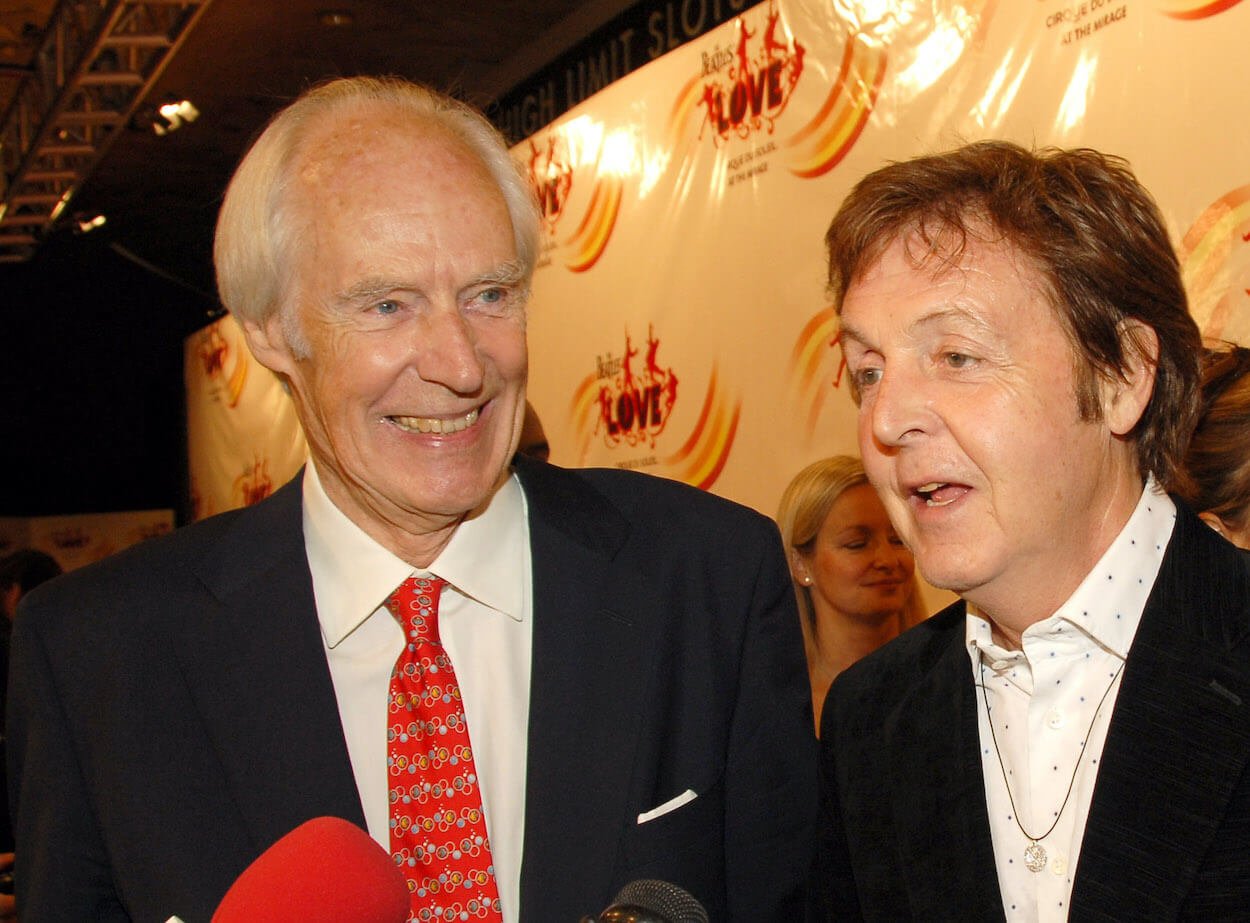 Producer George Martin (left) and Beatles bassist Paul McCartney standing side by side at a 2006 event.