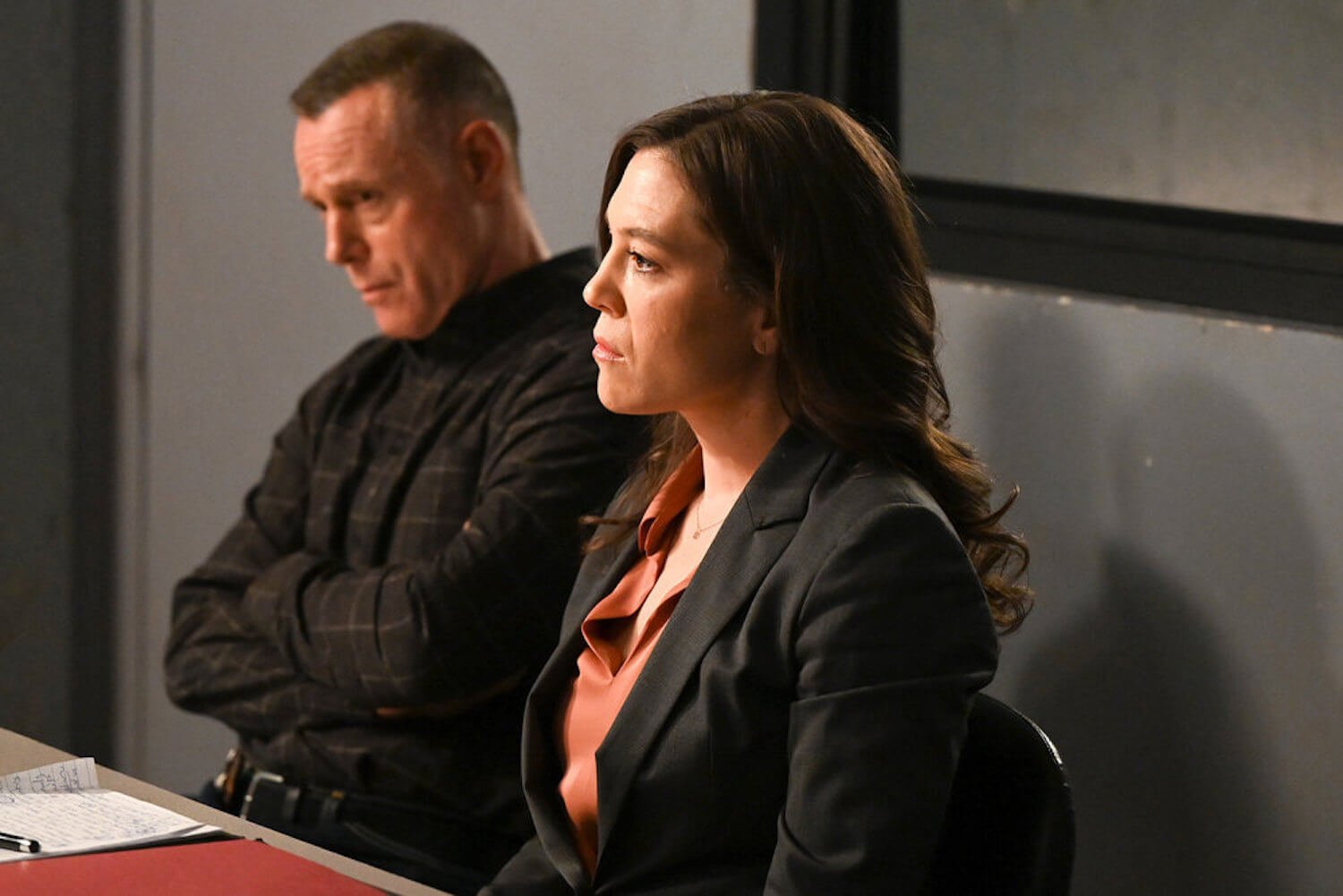 Hank Voight and Nina Chapman sitting next to each other in the 'Chicago P.D.' Season 10 finale