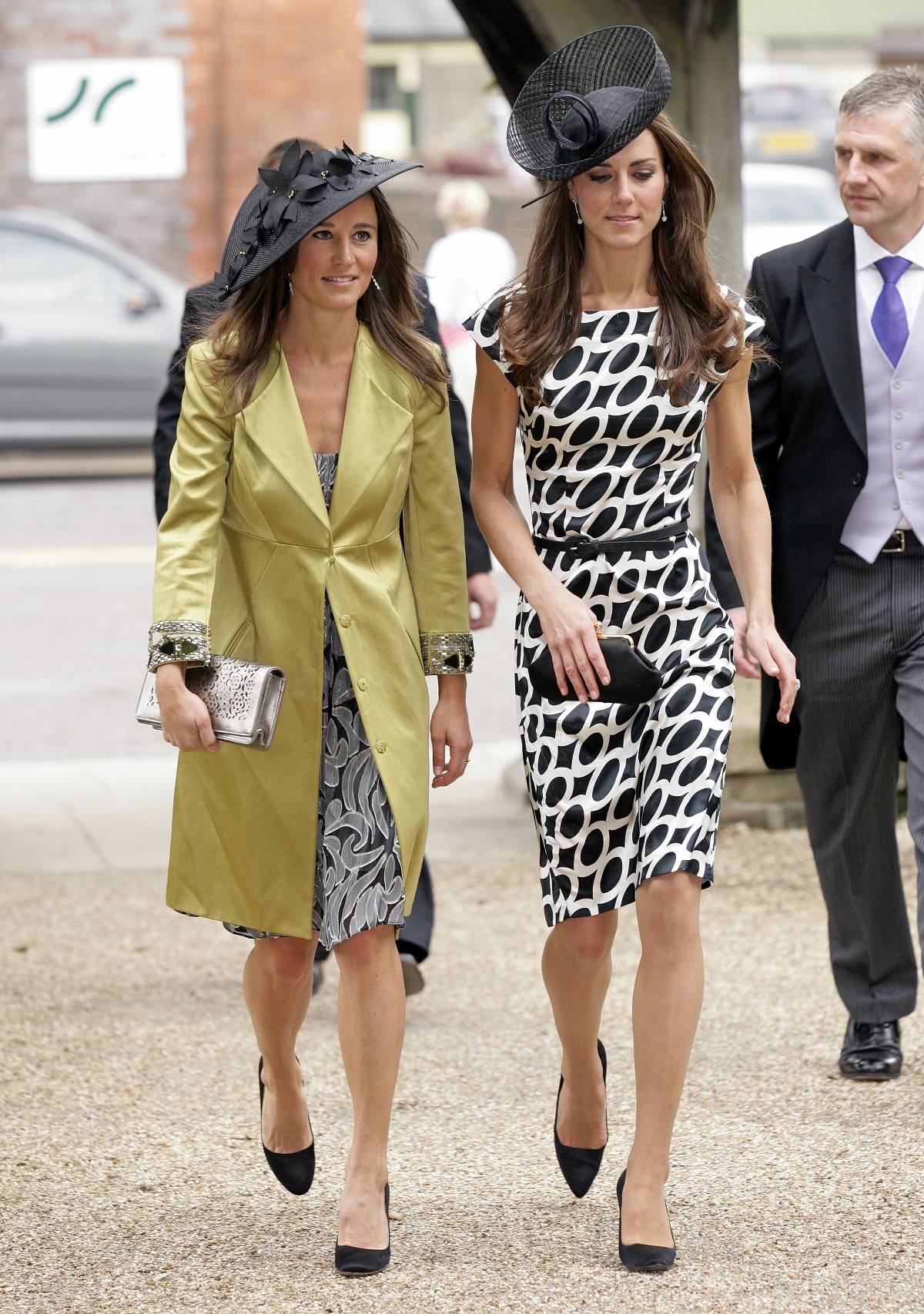 Kate Middleton and her sister, Pippa Middleton, attend the wedding of Sam Waley-Cohen and Annabel Ballin