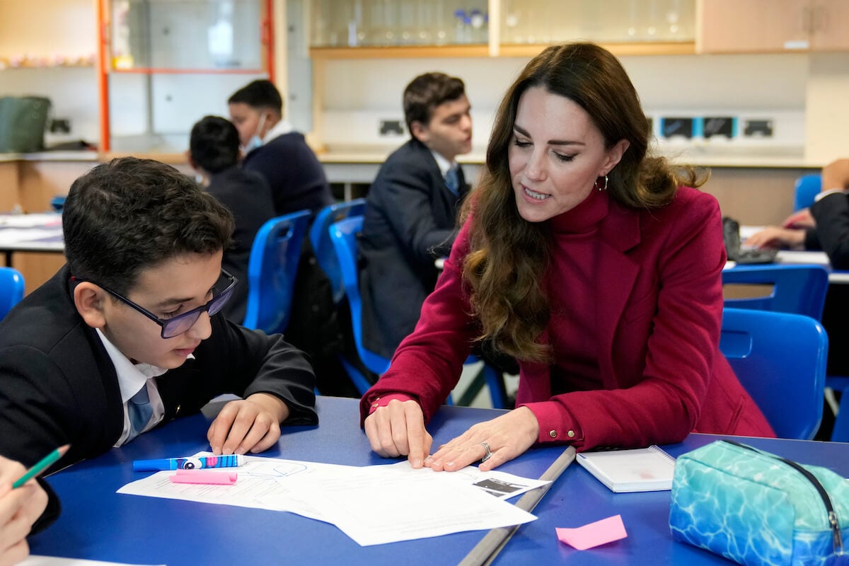 Kate Middleton, who demonstrated herself as a 'born teacher' at the 2023 Chelsea Flower Show, speaks with kids