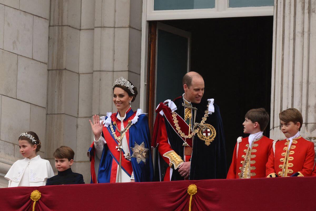 Kate Middleton, who is reportedly fine with starting a 'rift' with King Charles, stands with Princess Charlotte, Prince Louis, Prince William, Oliver Cholmondeley, and Prince George at King Charles' coronation