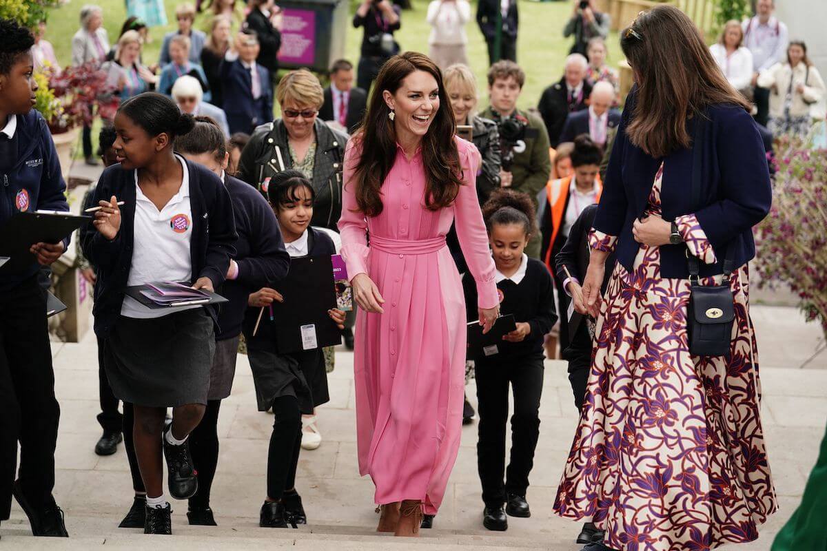 Kate Middleton, whose 2023 Chelsea Flower Show appearance had photographers breaking royal protocol by running, arrives at the event