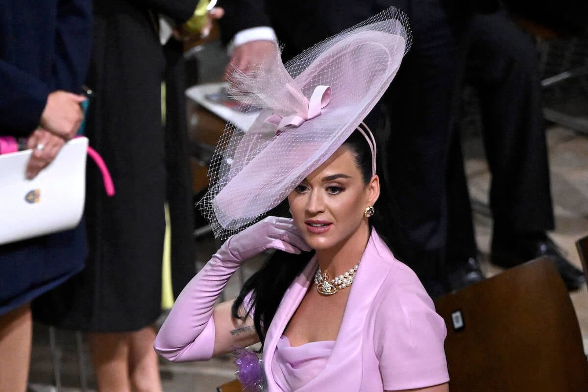 Katy Perry, who tweeted a reply after struggling to find her seat at King Charles III's coronation, leaves Westminster Abbey