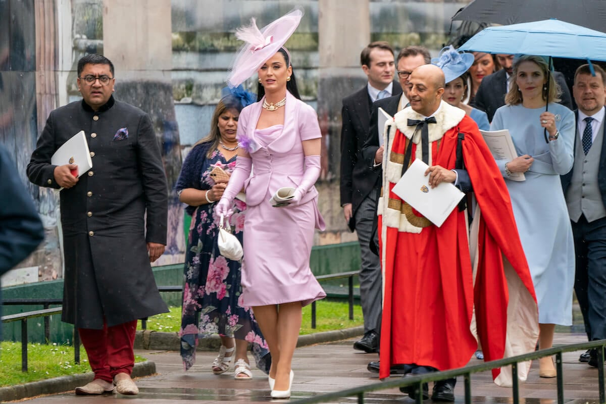 Katy Perry, who tweeted a response after struggling to find her seat at the coronation, leaves Westminster Abbey