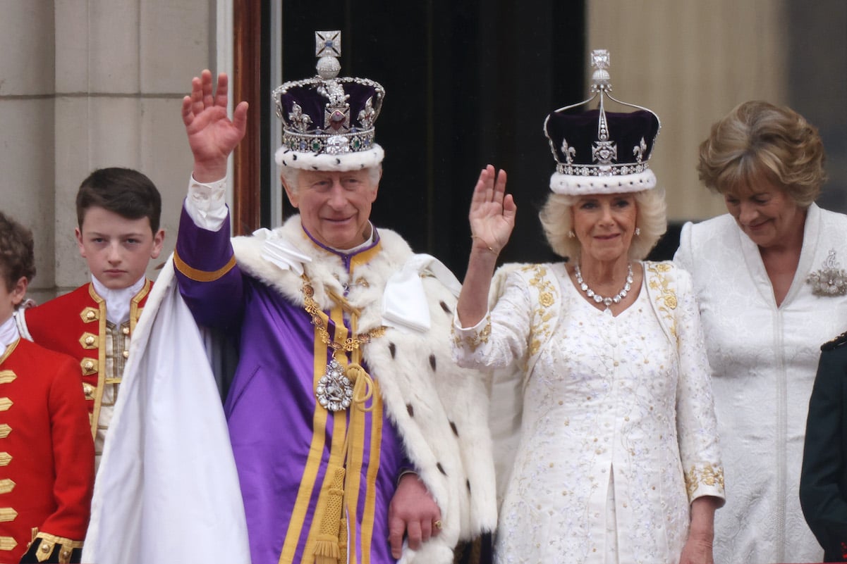 King Charles and Queen Camilla wave to the crowd on Coronation Day