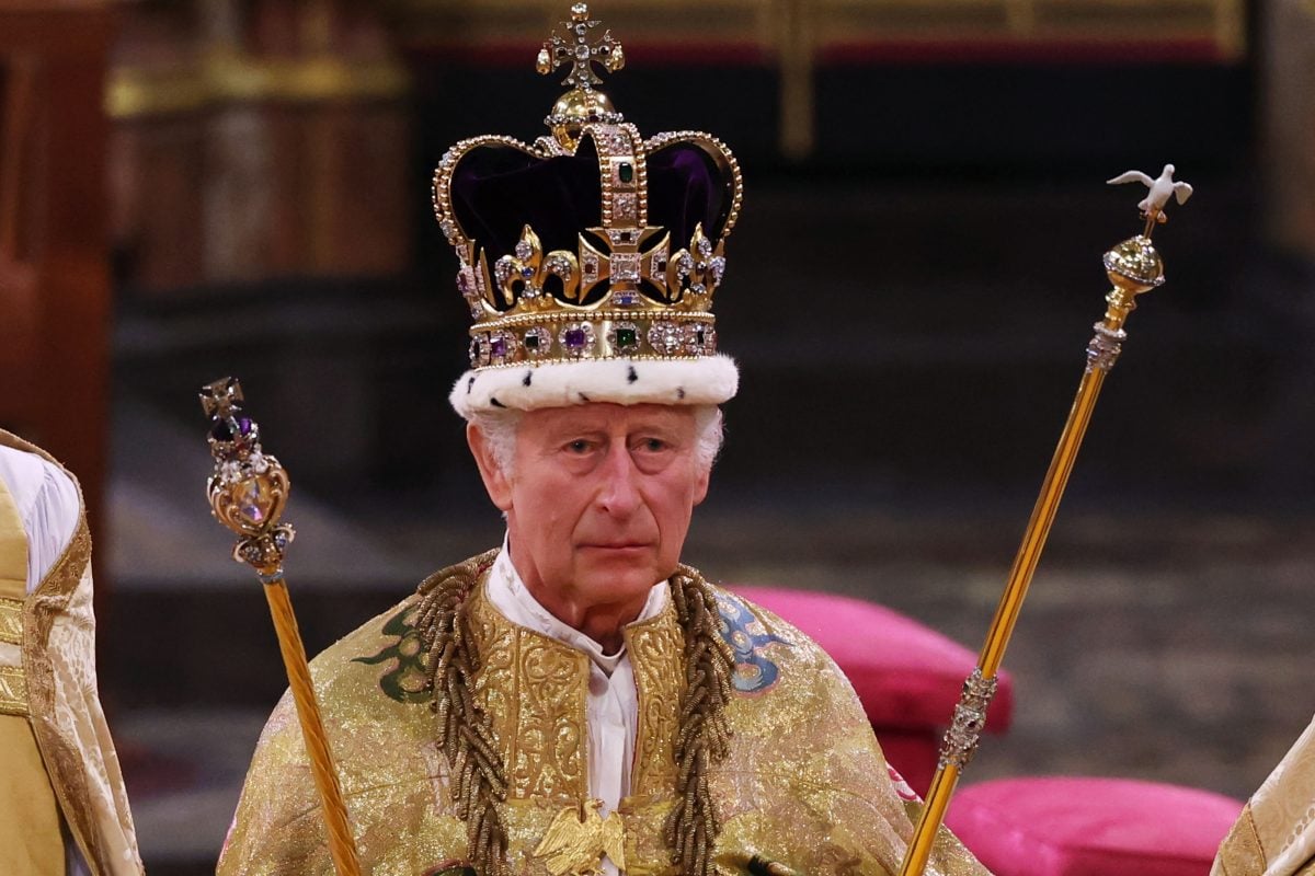 King Charles III stands after being crowned during his coronation ceremony in Westminster Abbey