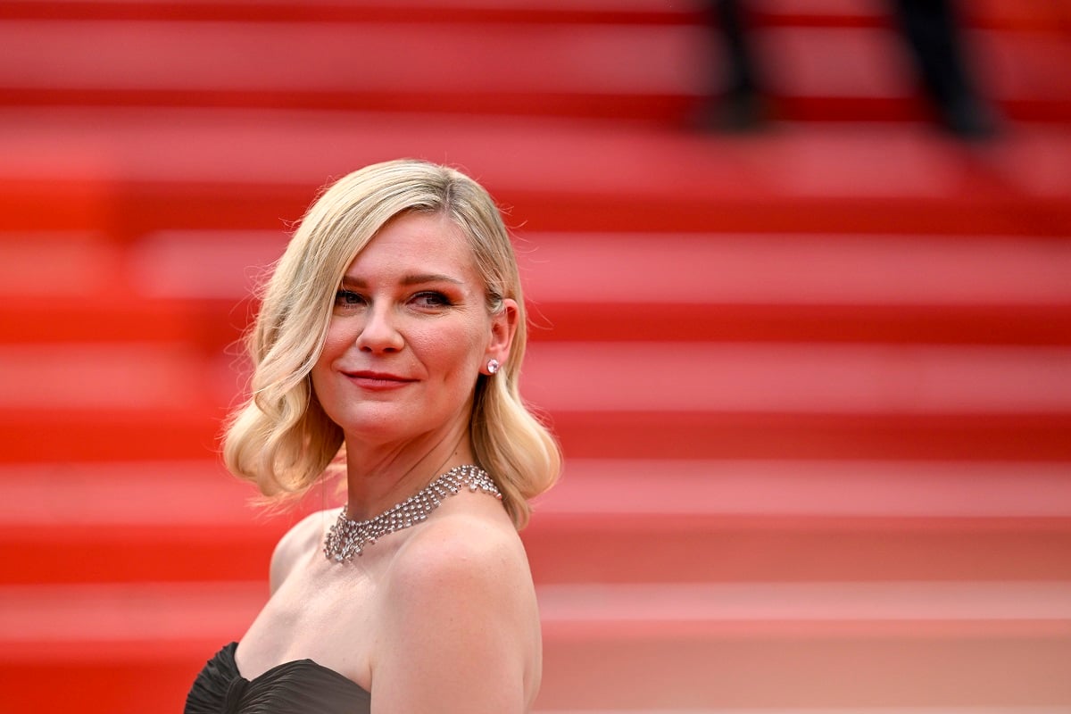 Kirsten Dunst posing at a screening of 'Killers Of The Flower Moon' at Cannes Film Festival.