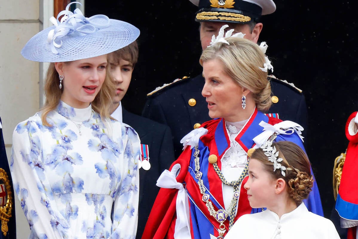 Lady Louise, who doesn't have to look to her mom as a 'role model,' according to a body language expert, stands with James, Viscount Severn, Princess Charlotte, and Sophie, Duchess of Edinburgh