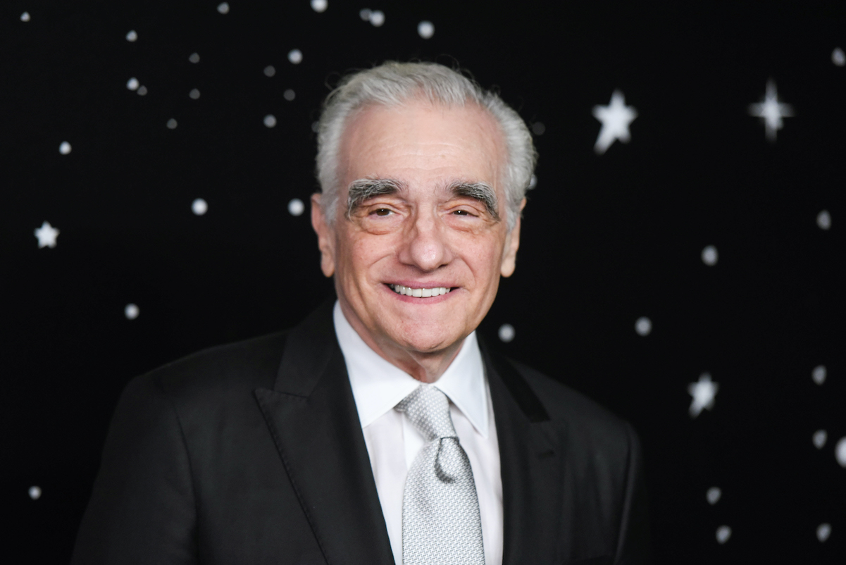 Marin Scorsese smiles while wearing a suit