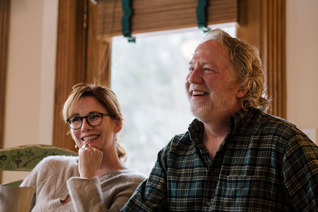 Melissa Gilbert and Timothy Busfield sit next to each other.