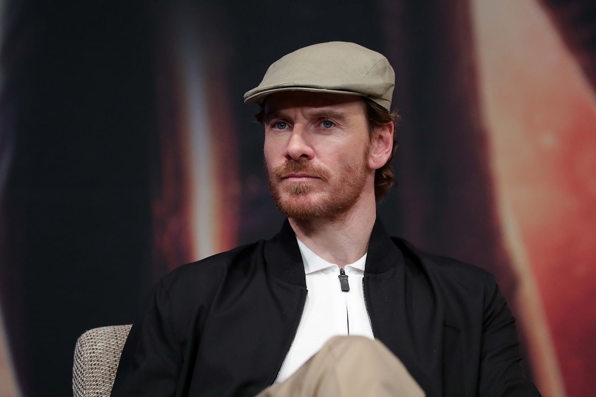 Michael Fassbender sitting down at a 'X-Men: Dark Phoenix' press conference.