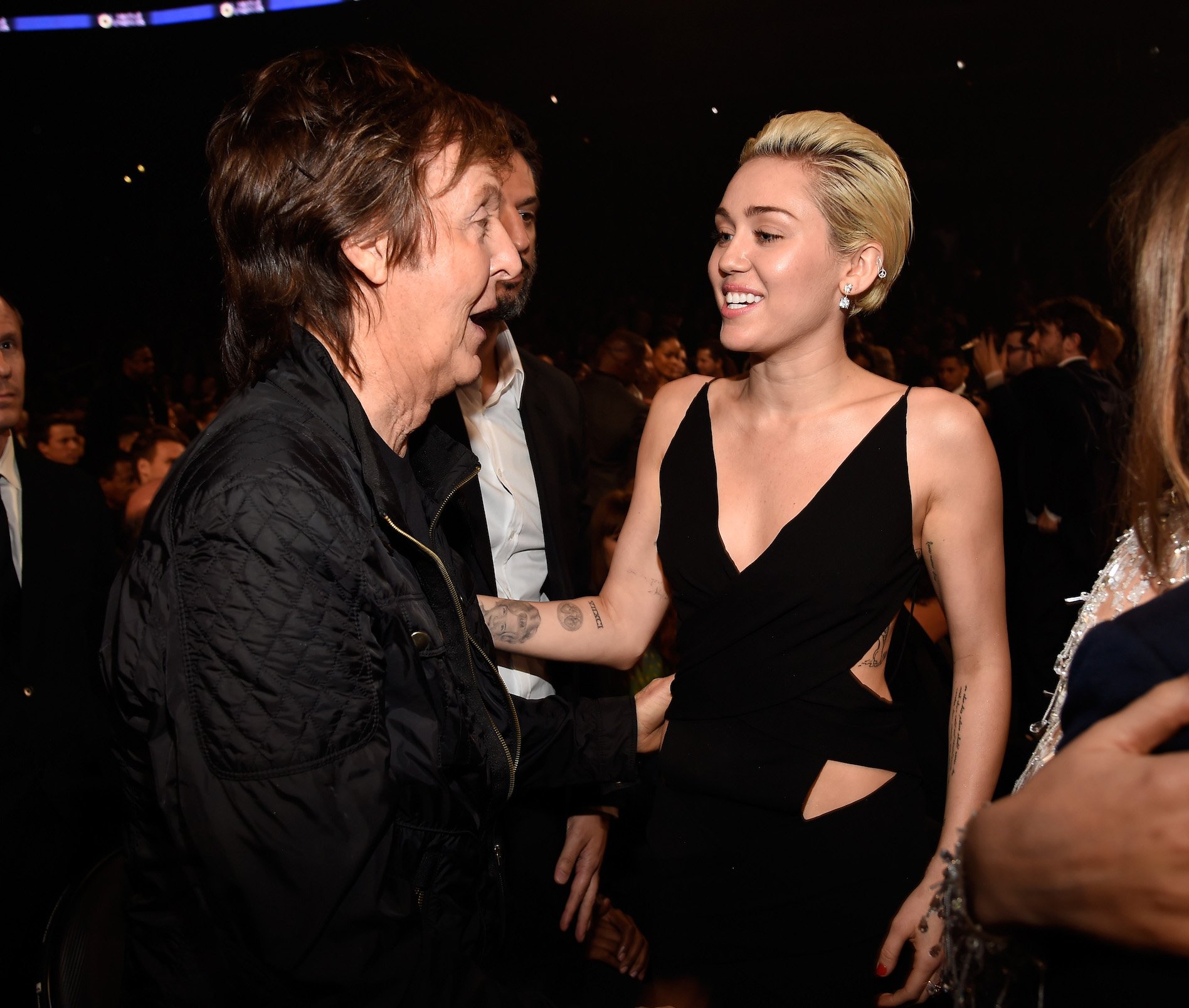 Paul McCartney and Miley Cyrus attend the 57th Annual Grammy Awards at the Staples Center in Los Angeles, California