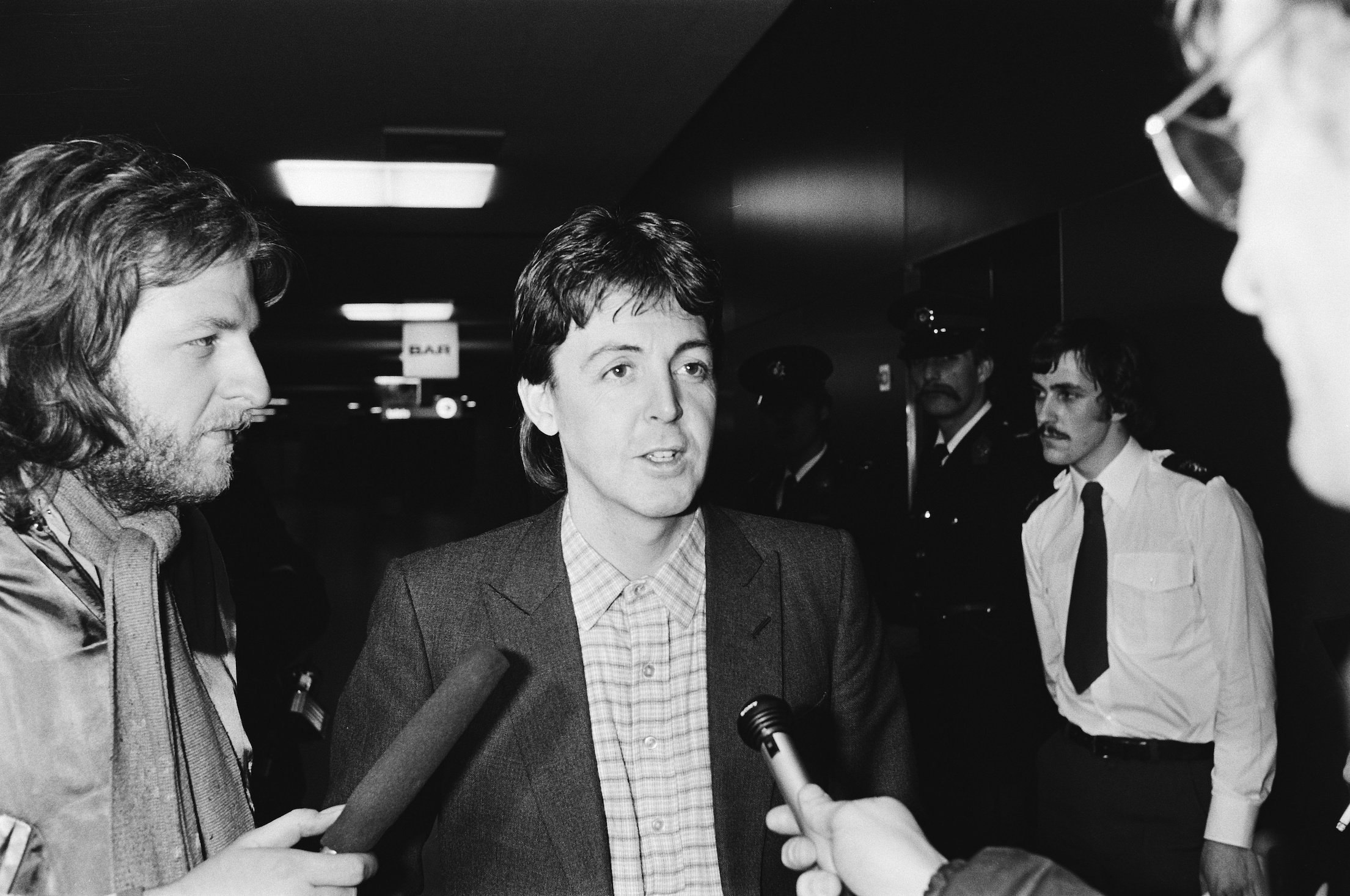 Paul McCartney at Schiphol Airport after being deported from Japan for possession of marijuana