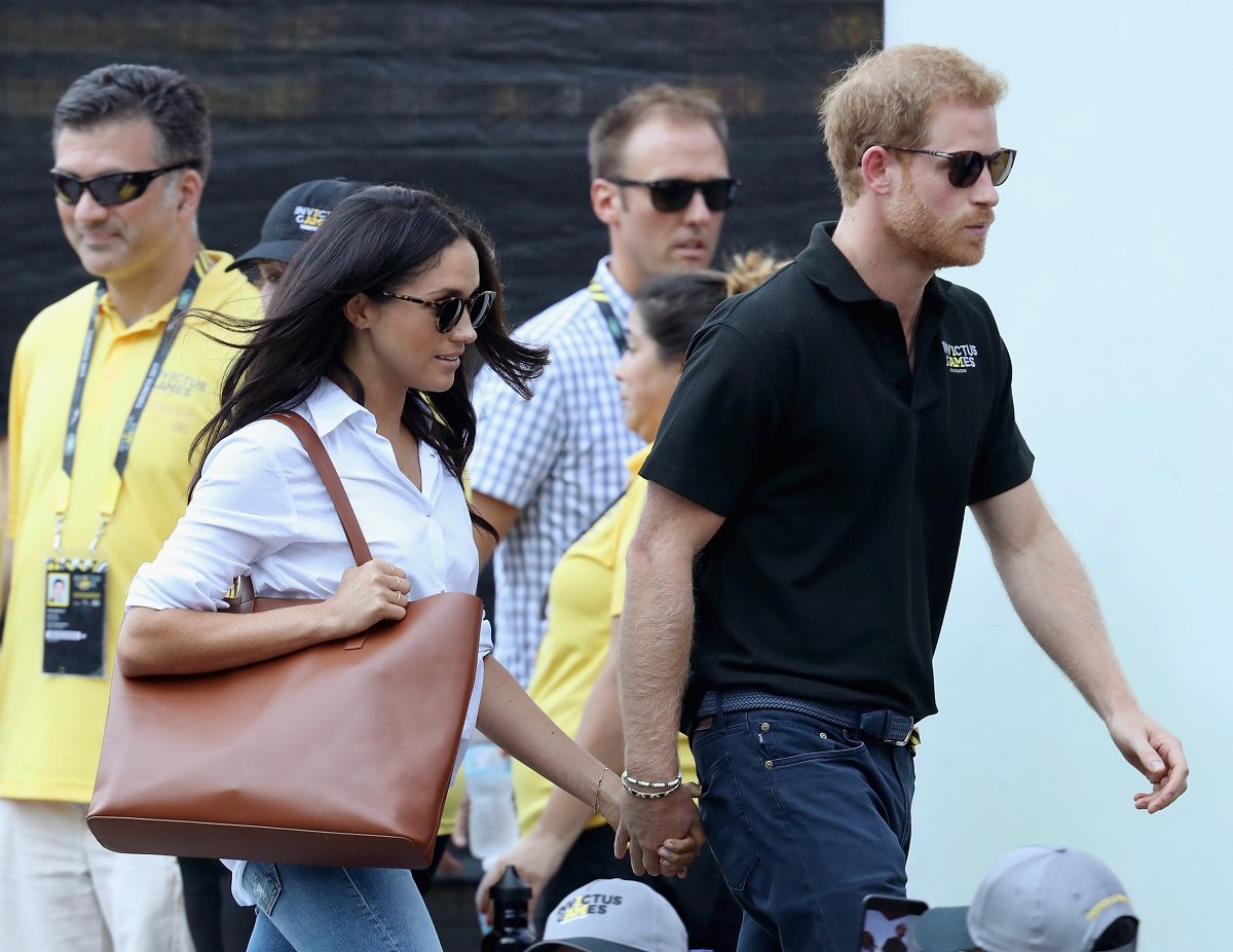 Prince Harry and Meghan Markle attend a Wheelchair Tennis match during the Invictus Games 2017