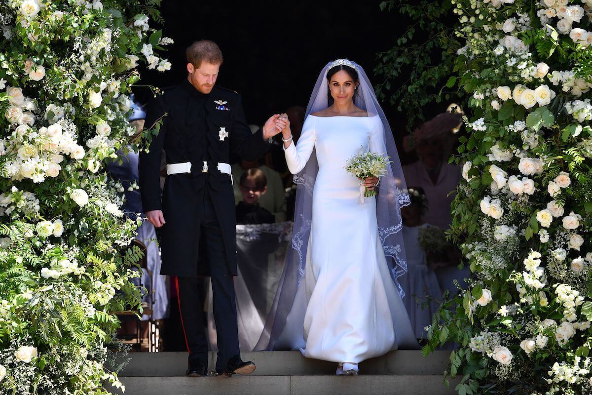 Prince Harry and Meghan Markle, who saw snipers 'first thing' after royal wedding, leave St. George's Chapel on May 19, 2018.