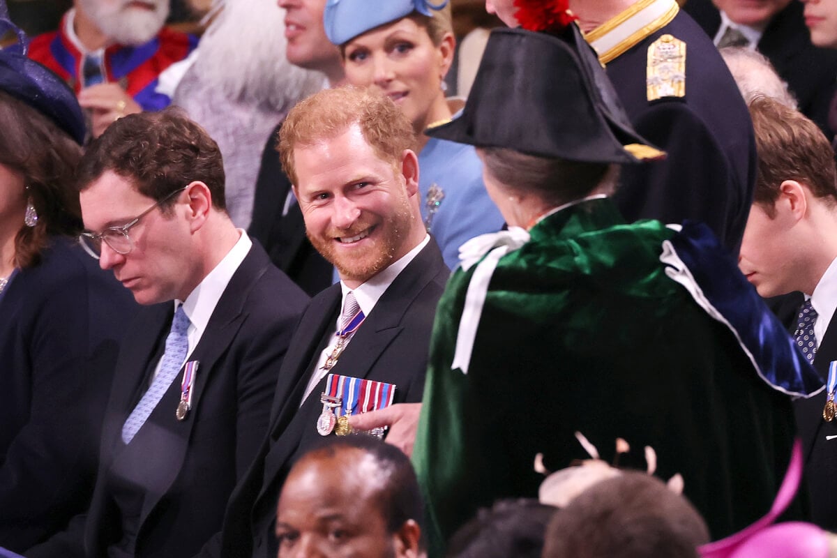 Prince Harry, Duke of Sussex speaks to Princess Anne, Princess Royal during the Coronation of King Charles III and Queen Camilla at Westminster Abbey on May 6, 2023 in London, England