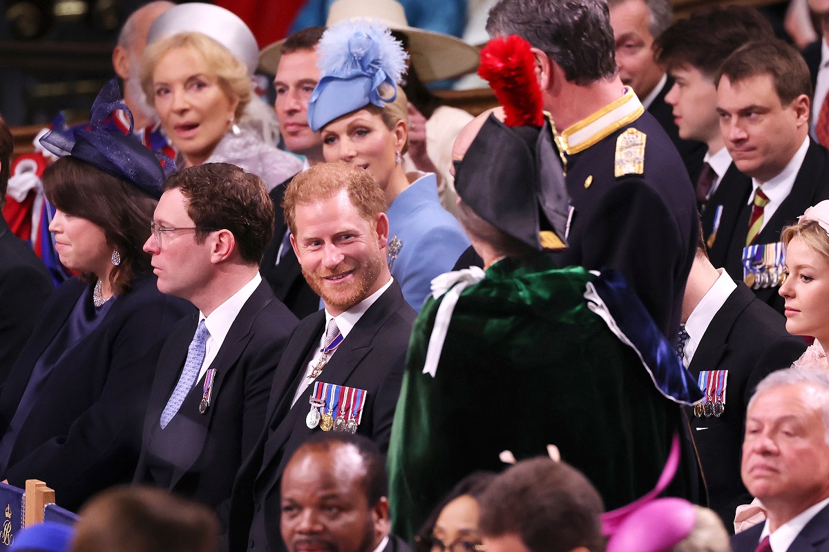 Prince Harry smiles at Princess Anne during the Coronation of King Charles III and Queen Camilla