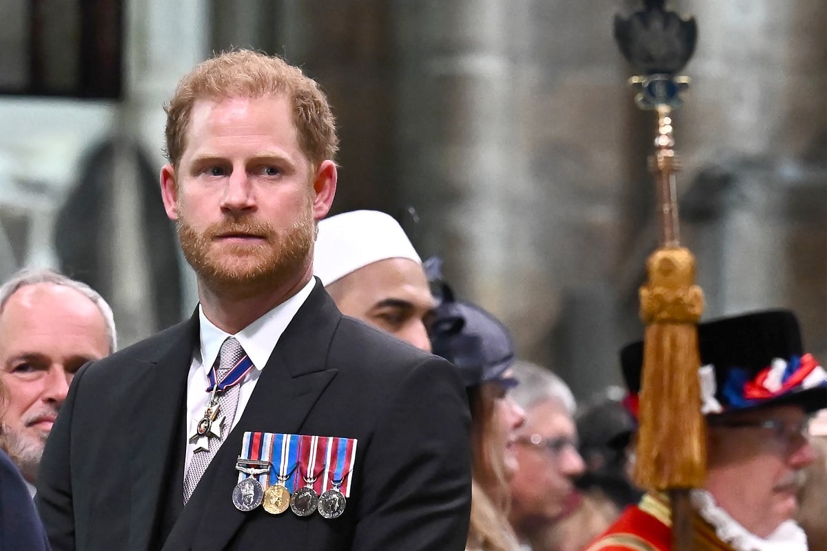 Prince Harry, who a body language expert saw make a gesture to ignore Prince William, at the coronation of King Charles III