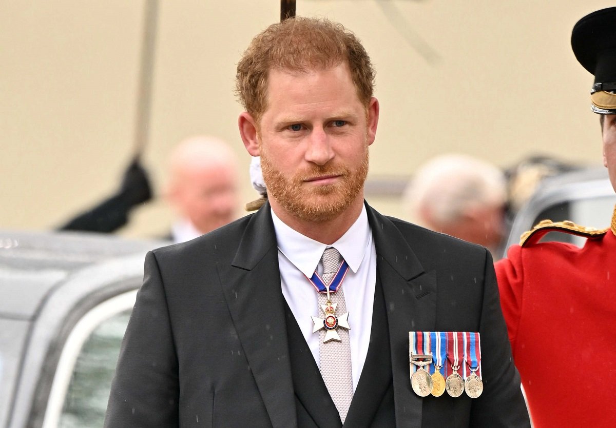 Prince Harry, who had his words deciphered by a lip reader at the Coronation of King Charles III, arriving at Westminster Abbey