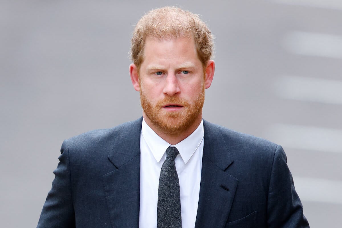 Prince Harry, who will have an 'emotionally harder' time at the coronation, looks on