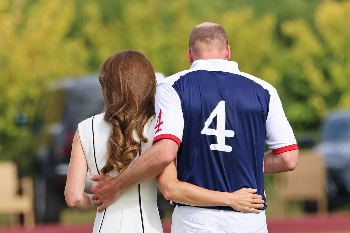 Prince William, who is 'lucky' to have Kate Middleton, according to author Tom Quinn, walks with Kate Middleton