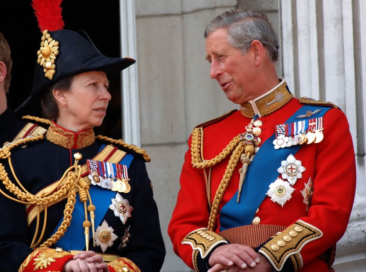 Princess Anne, who a former royal butler says works harder than King Charles, chat on the balcony of Buckingham Palace following the Trooping the Colour