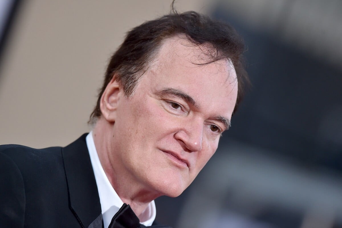 Quentin Tarantino posing at the 'Once Upon a Time ... in Hollywood' premiere.