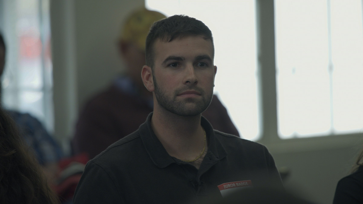 Ronald Gladden sitting in front of a window in Amazon Freevee's 'Jury Duty'