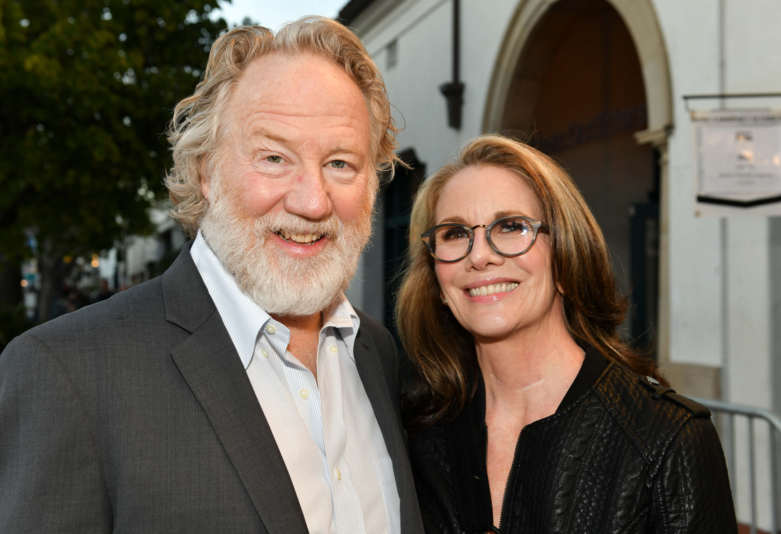 Timothy Busfield and Melissa Gilbert, who moved to the Catskills in 2019, pose for a photo outside.