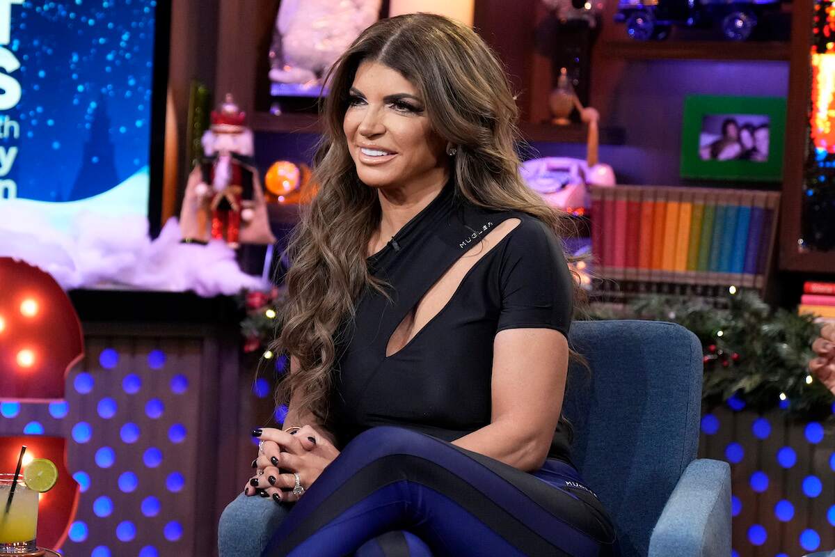 Teresa Giudice films Watch What Happens Live in a black top and striped pants