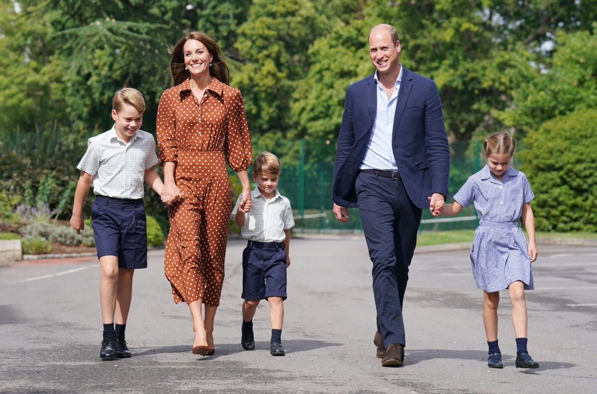 Prince George, Princess Charlotte and Prince Louis (C), accompanied by their parents the Prince William, Duke of Cambridge and Catherine, Duchess of Cambridge, arrive for a settling in afternoon at Lambrook School, near Ascot on September 7, 2022 in Bracknell, England. The family have set up home in Adelaide Cottage in Windsor's Home Park as their base after the Queen gave them permission to lease the four-bedroom Grade II listed home