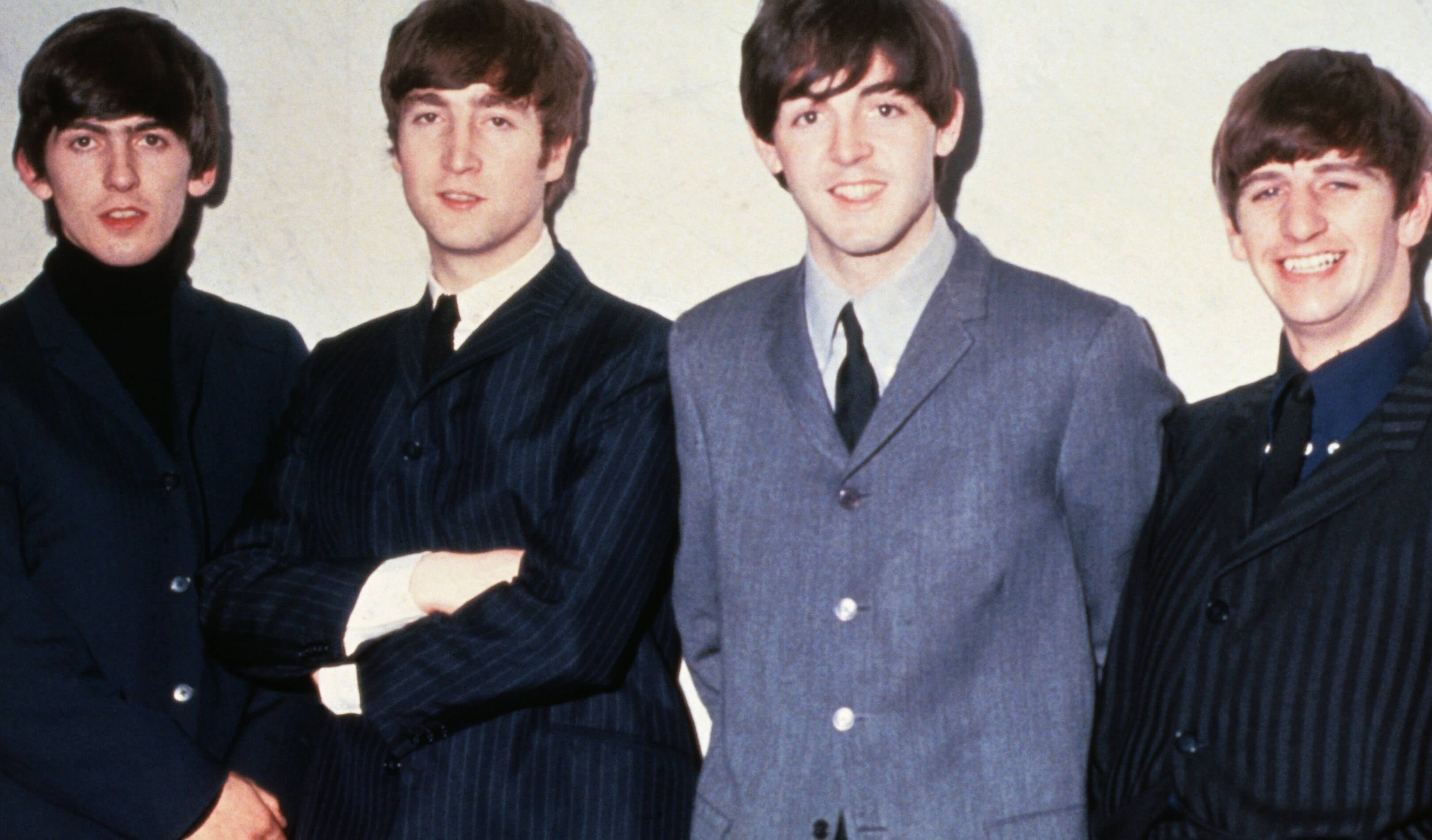 The Beatles in suits