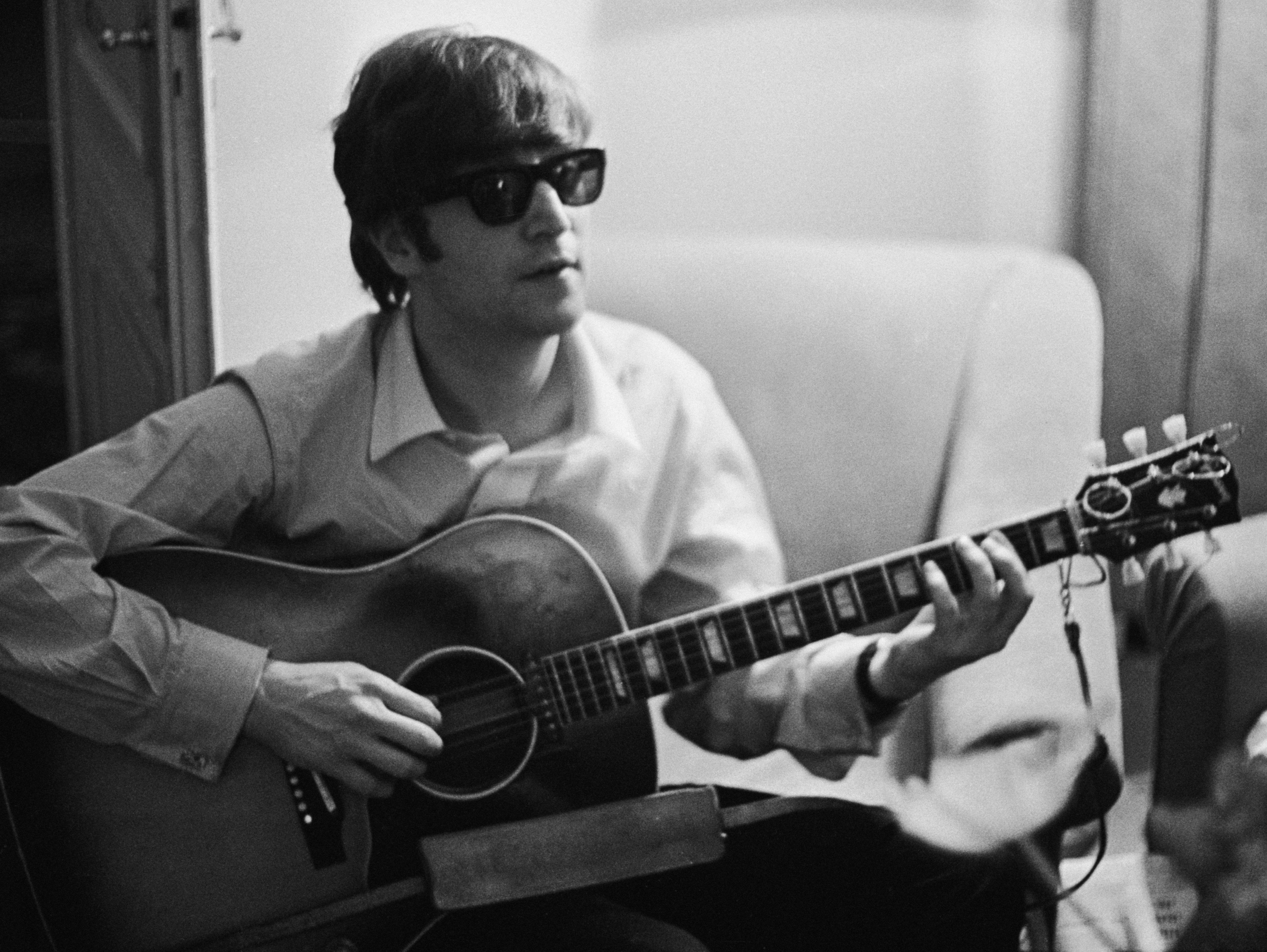 John Lennon with a guitar